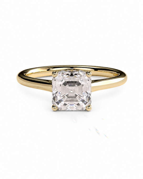 color_10K_YG, color_14K_YG &&	
A yellow gold engagement ring featuring a large, square-cut clear gemstone in a four-prong setting, shown on a clean white background.