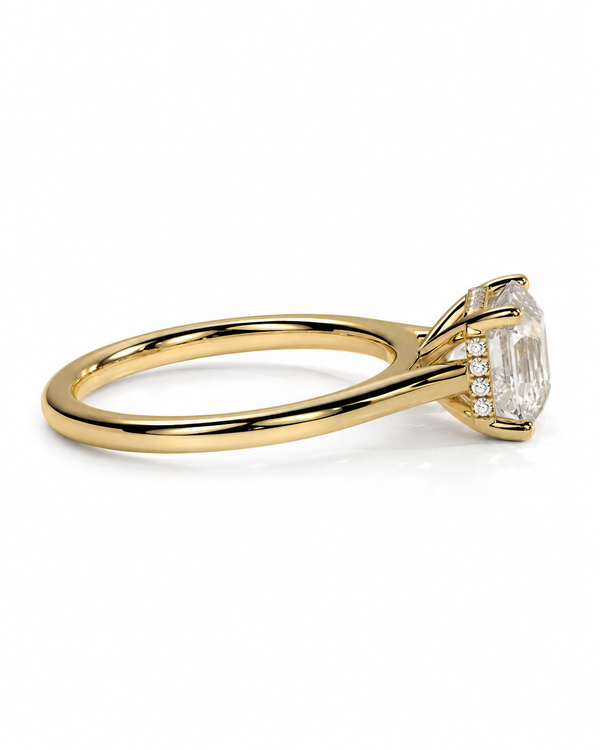 color_10K_YG, color_14K_YG &&	
A yellow gold engagement ring featuring a large emerald-cut center stone and small side stones, shown on a clean white background.