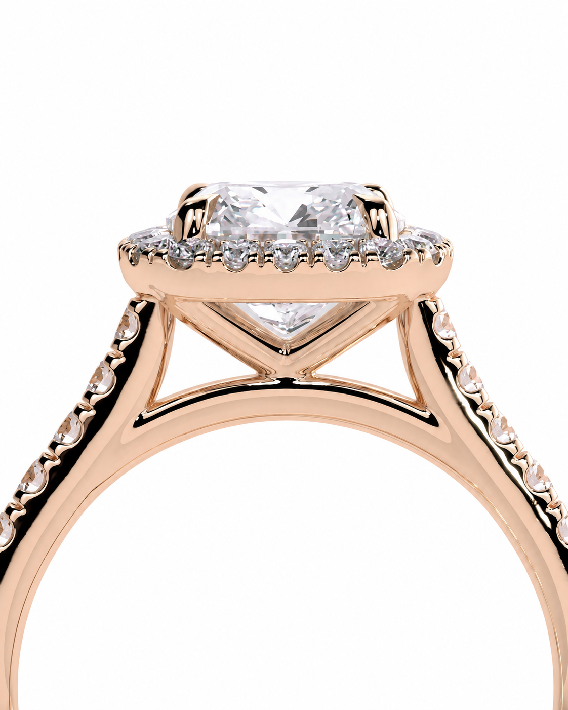 color_10K_RG, color_14K_RG &&	Rose gold diamond ring with a large round-cut center stone and a halo of smaller diamonds, shown in a close-up studio shot on a white background.