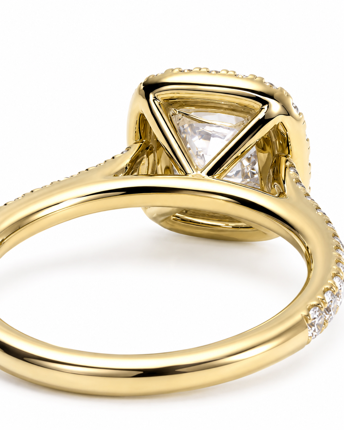 color_10K_YG, color_14K_YG &&	
A close-up shot of a yellow gold ring featuring a triangular clear gemstone in a geometric prong setting, with small pave accents along the band, set against a plain white background.