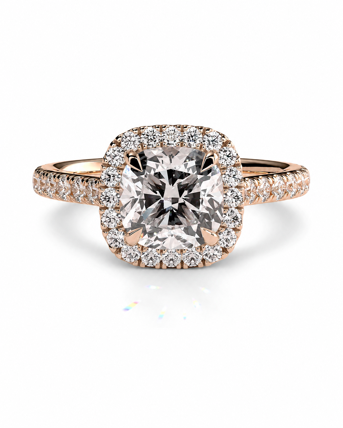 color_10K_RG, color_14K_RG &&	A cushion-cut diamond halo ring in rose gold with pave-set diamonds on the band, shown on a clean white background.