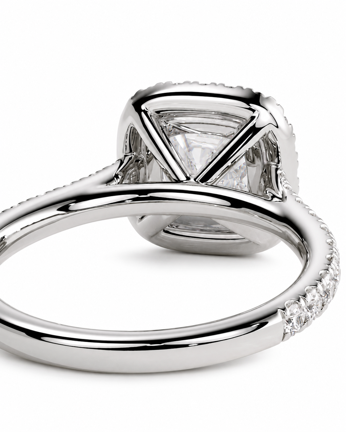 color_925_SIL,color_935_ARG,color_10K_WG, color_14K_WG &&	
A close-up studio shot of a silver-toned ring featuring a large rectangular clear gemstone in a prong setting, with a shank decorated with small pave stones, on a white background.