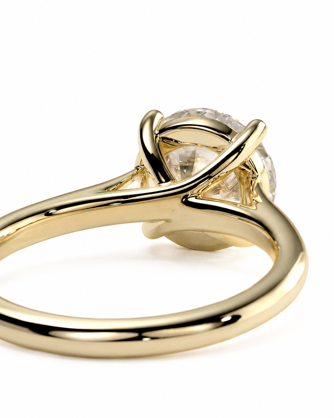 color_10K_YG, color_14K_YG &&	
A close-up shot of a yellow gold ring with a round clear gemstone in a prong setting, shown on a plain white background.