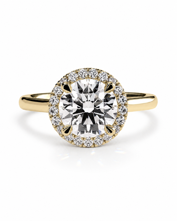 color_10K_YG, color_14K_YG &&	
A yellow gold halo engagement ring featuring a large round-cut center diamond surrounded by a halo of smaller diamonds, set on a polished band against a white background.