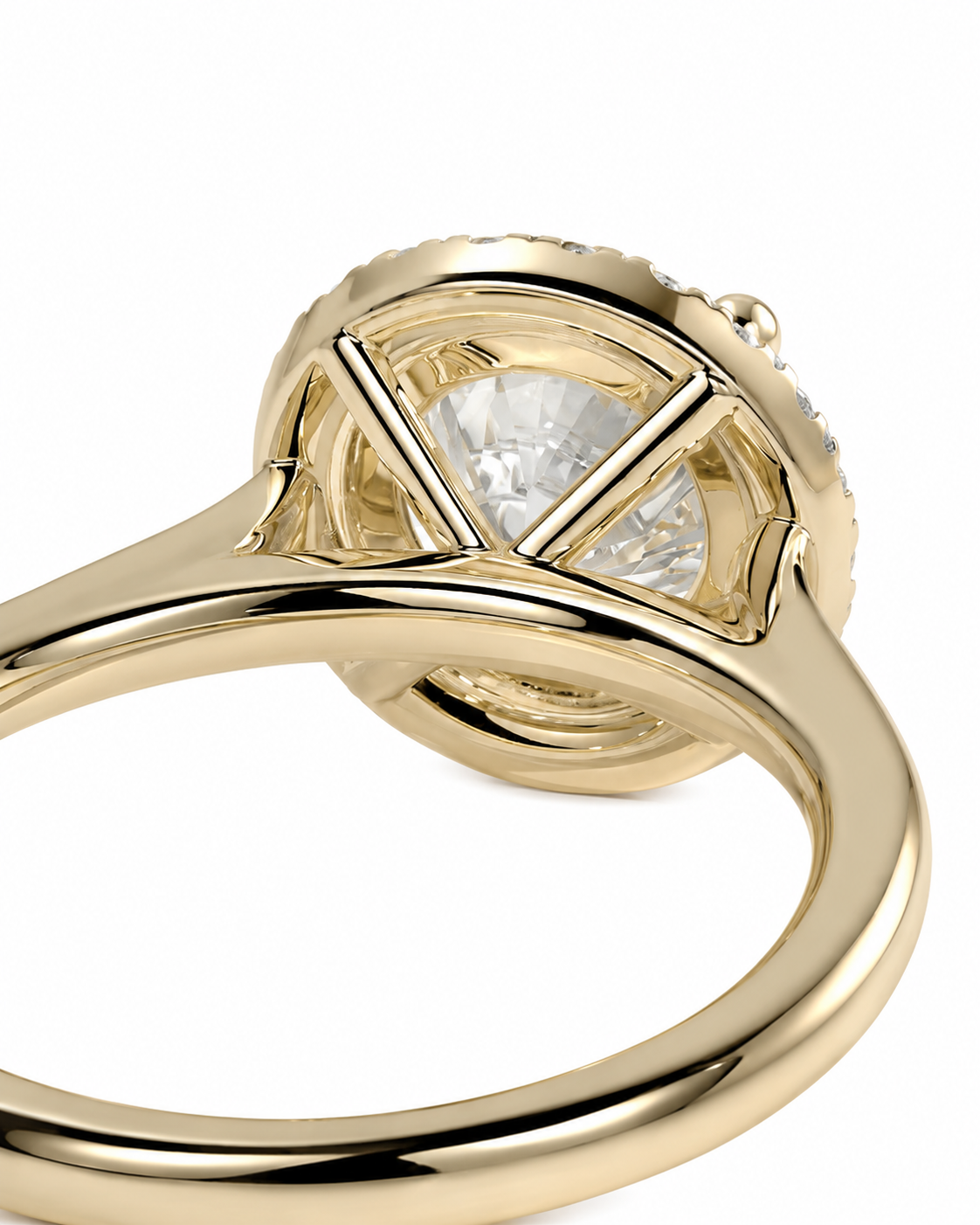 color_10K_YG, color_14K_YG &&	
Close-up of a yellow gold ring with a round brilliant-cut diamond in a three-stone setting, showing the polished metal band and bezel on a white background.