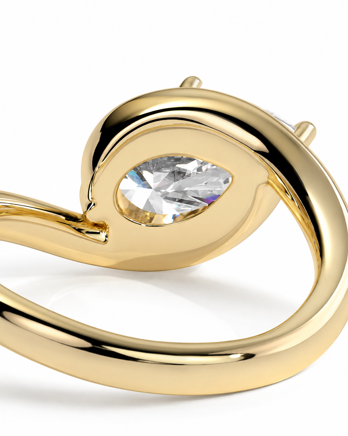 color_10K_YG, color_14K_YG &&
A close-up of a polished yellow gold ring featuring a marquise-cut clear gemstone in a prong setting, shown against a clean white background.