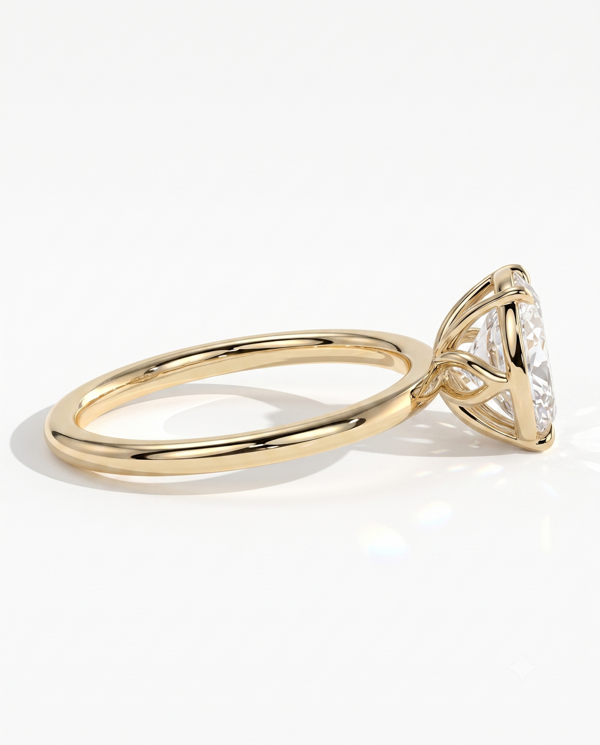 color_10K_YG, color_14K_YG &&	
A yellow gold solitaire engagement ring with a round brilliant-cut diamond, shown from a side profile view on a clean white background.
