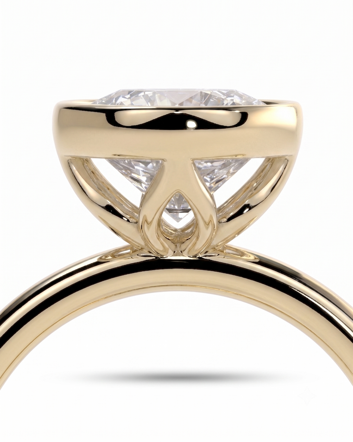 color_10K_YG, color_14K_YG &&	
A close-up studio shot of a yellow gold solitaire engagement ring with a round brilliant-cut diamond, set against a clean white background.