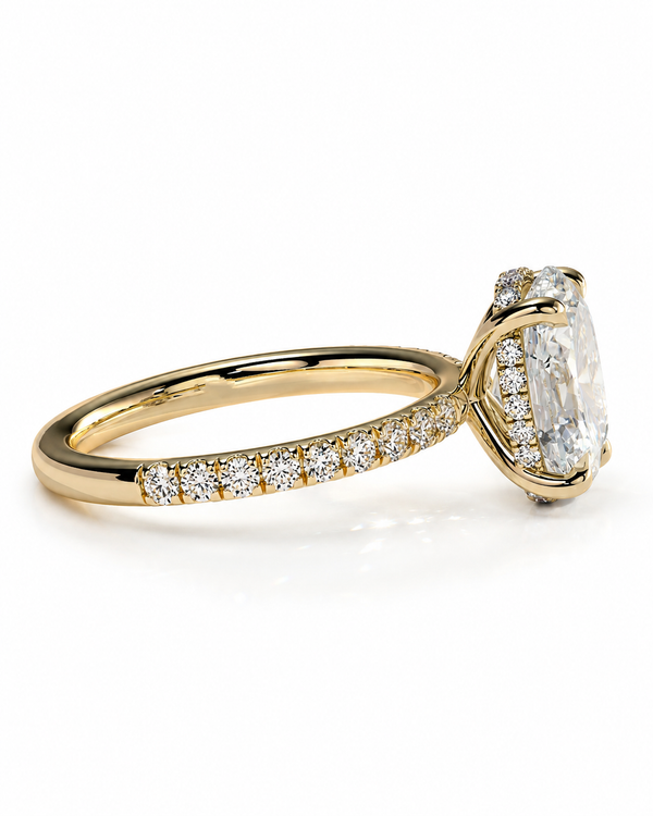 color_10K_YG, color_14K_YG &&	
A yellow gold engagement ring featuring a large oval-cut clear gemstone in a prong setting, with a pave band of small round diamonds on a clean white background.