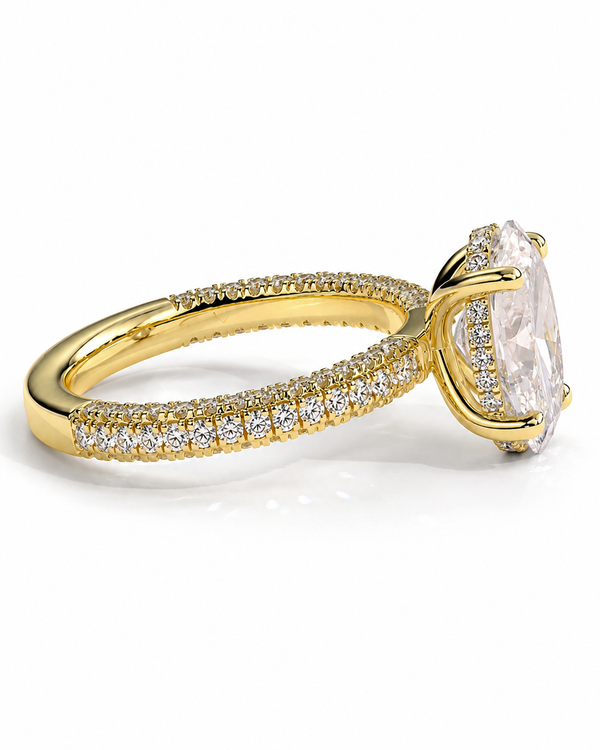 color_10K_YG, color_14K_YG &&	
A yellow gold ring featuring a large oval clear gemstone in a prong setting, with pave diamond accents along the split shank, shown on a white background.