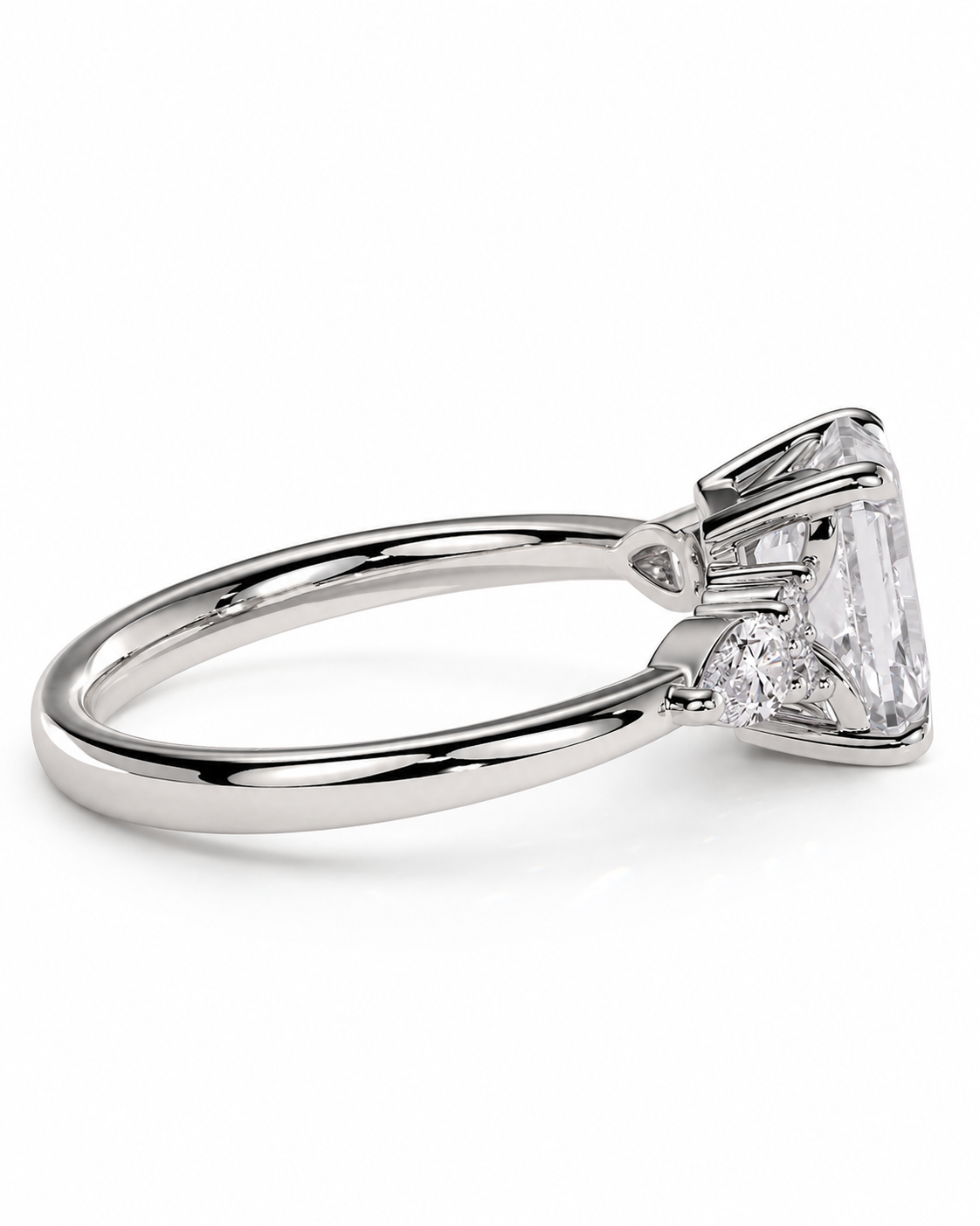 color_925_SIL,color_935_ARG,color_10K_WG, color_14K_WG &&A silver-toned diamond ring featuring a large emerald-cut center stone and a smaller round diamond accent, shown on a clean white background.