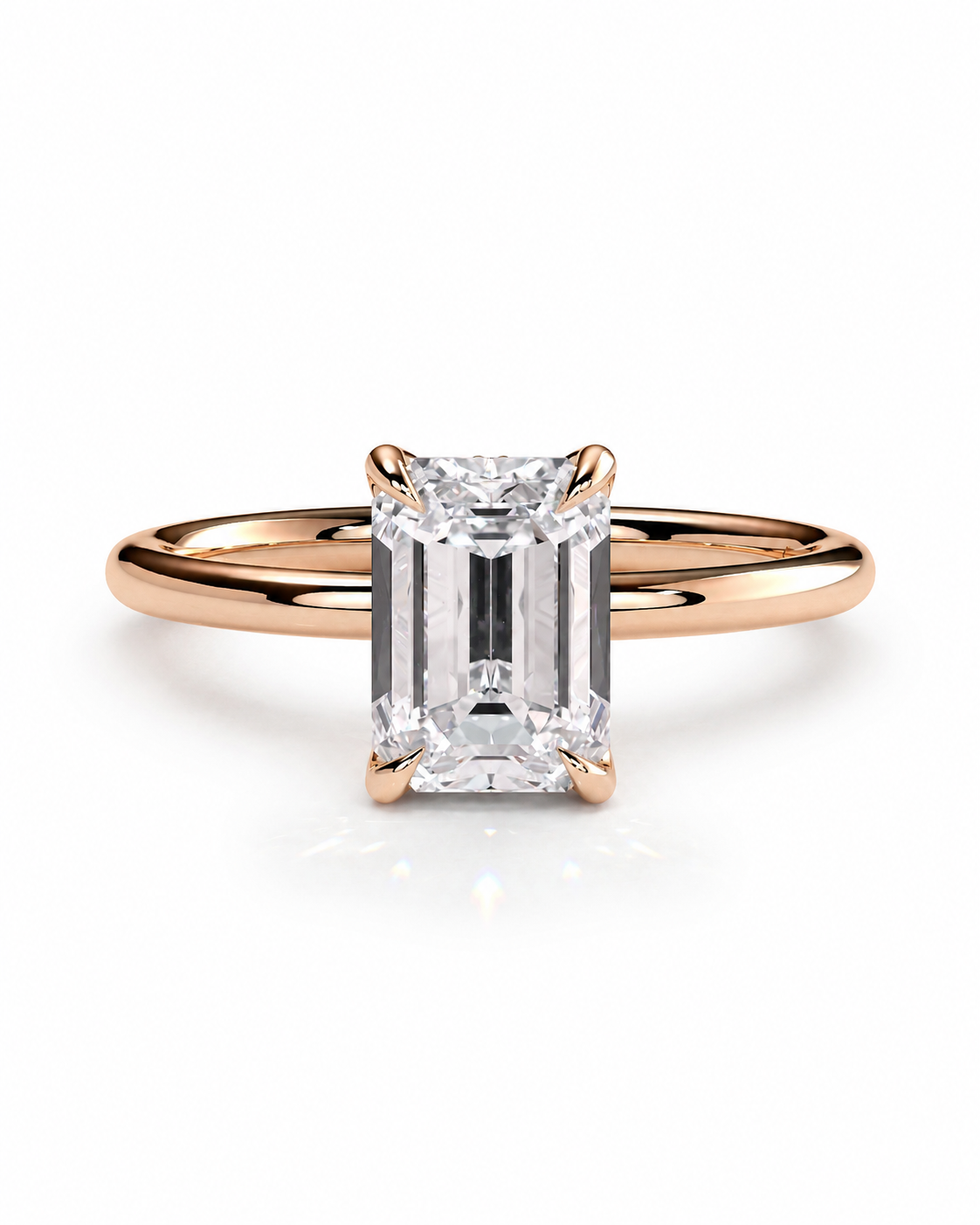 color_10K_RG, color_14K_RG &&
An emerald-cut diamond engagement ring in a rose gold band, centered on a clean white background.