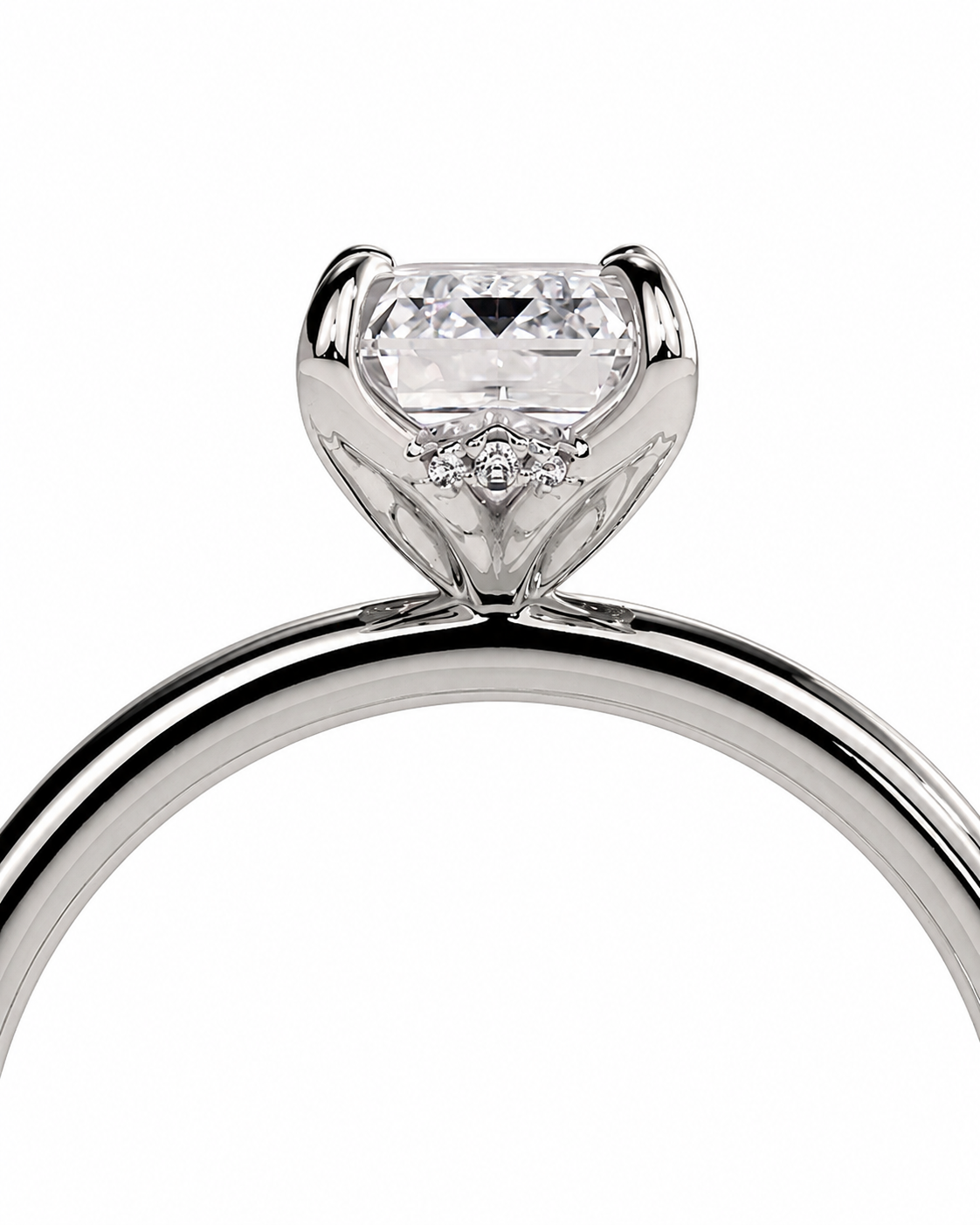 color_925_SIL,color_935_ARG,color_10K_WG, color_14K_WG &&
A close-up studio shot of a silver-toned solitaire engagement ring with a heart-shaped clear gemstone and small accent diamonds on a white background.