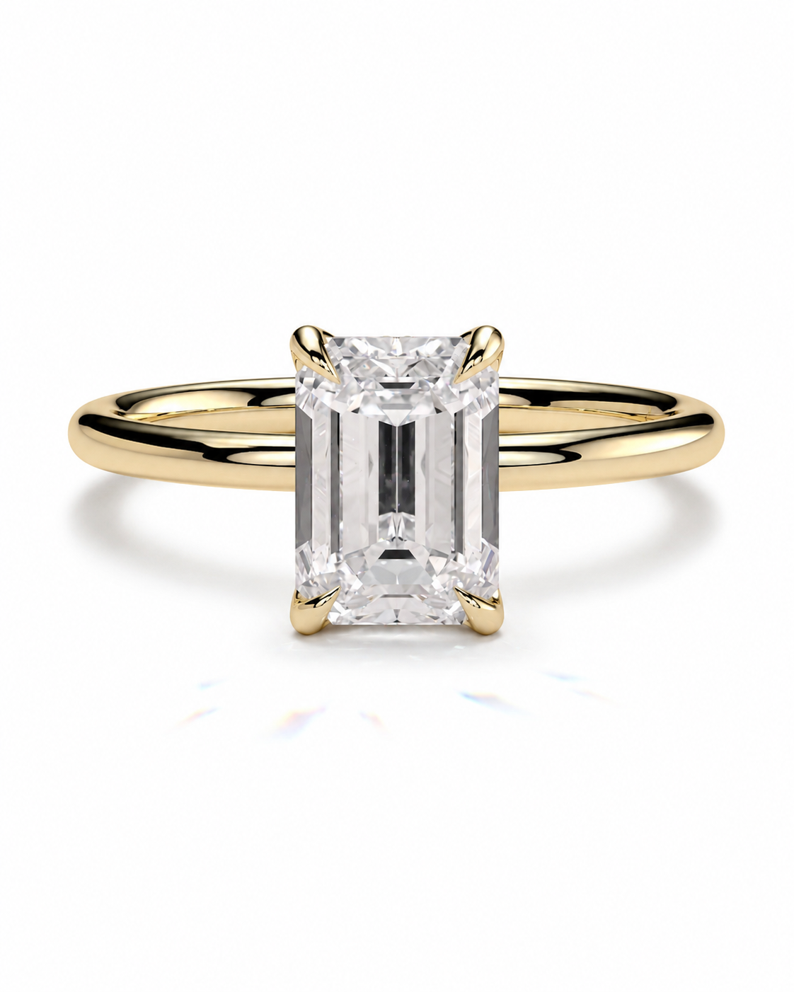 color_10K_YG, color_14K_YG &&
An emerald-cut diamond engagement ring with a yellow gold band, shown on a clean white background.
