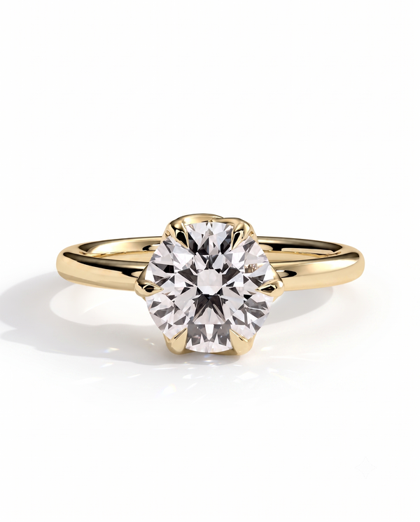 color_10K_YG, color_14K_YG &&A yellow gold solitaire engagement ring with a round brilliant-cut diamond center stone, shown on a clean white background with a soft shadow.