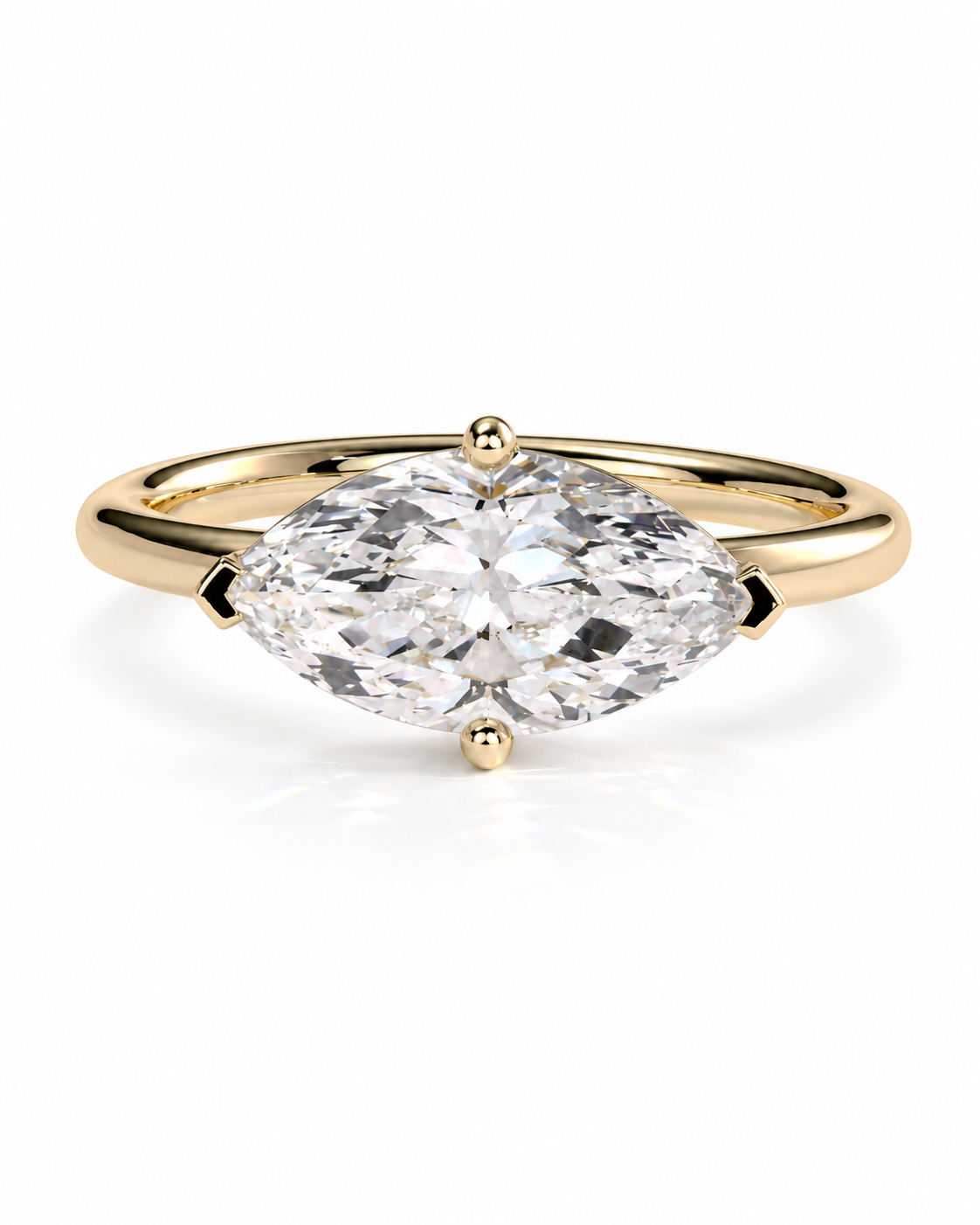 color_10K_YG, color_14K_YG &&A yellow gold ring featuring a large marquise-cut clear gemstone in a four-prong setting, shown against a clean white background.