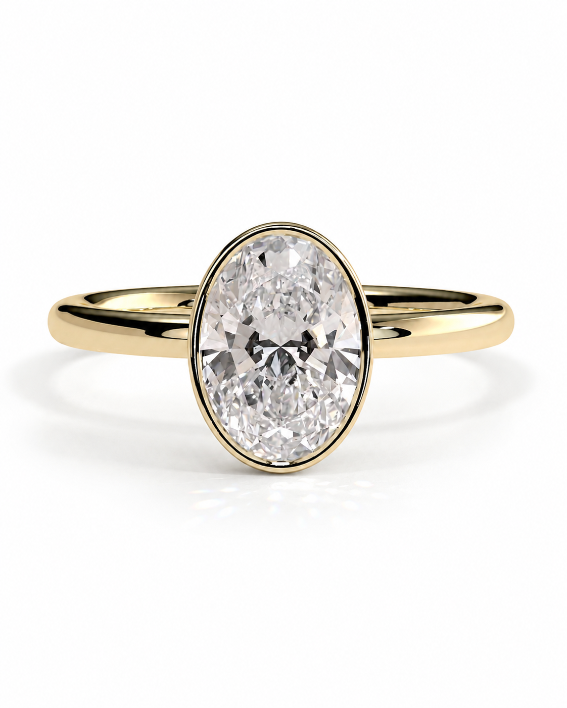 color_10K_YG, color_14K_YG &&An oval diamond engagement ring with a yellow gold band, shown on a clean white background.