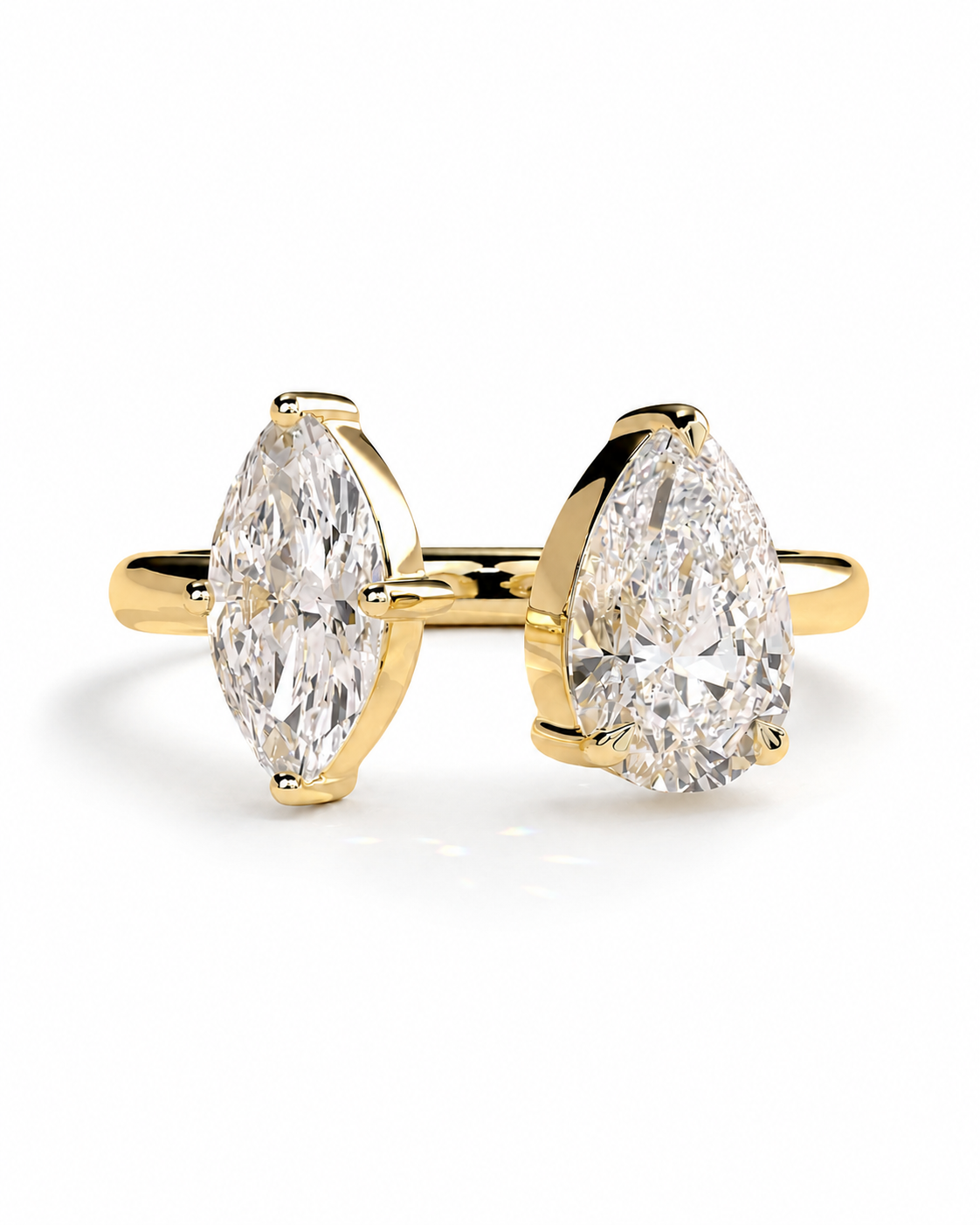 color_10K_YG, color_14K_YG &&A yellow gold ring featuring two marquise-cut diamonds on a split shank, photographed on a clean white background.
