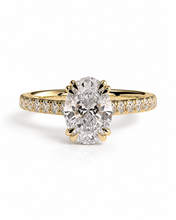 color_10K_YG, color_14K_YG &&A yellow gold engagement ring featuring a large oval-cut center diamond and a pavé band with small round diamonds, set against a clean white background.