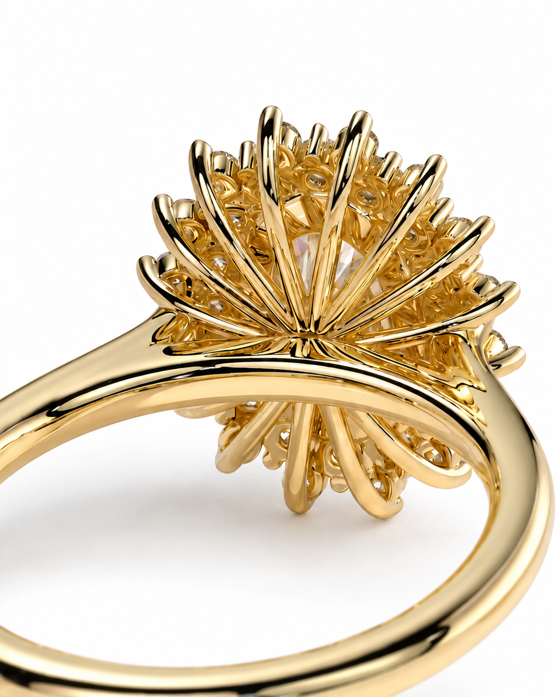 color_10K_YG, color_14K_YG &&A close-up of a gold ring featuring a large, intricate sunburst cluster of small clear stones on a polished yellow gold band, set against a plain white background.