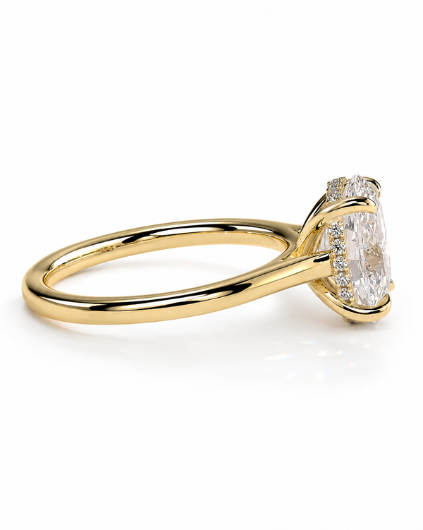 color_10K_YG, color_14K_YG &&A yellow gold engagement ring featuring a large oval-cut center stone surrounded by a halo of small round stones, set against a clean white background.