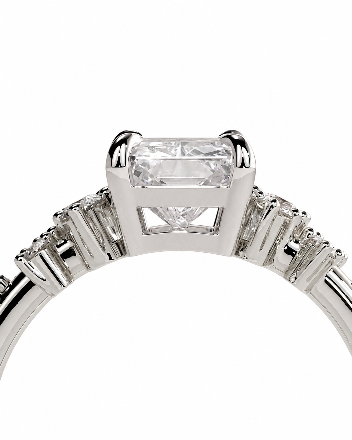 color_925_SIL,color_935_ARG,color_10K_WG, color_14K_WG &&Close-up of a silver-toned ring featuring a rectangular clear center stone and smaller side stones on a white background.