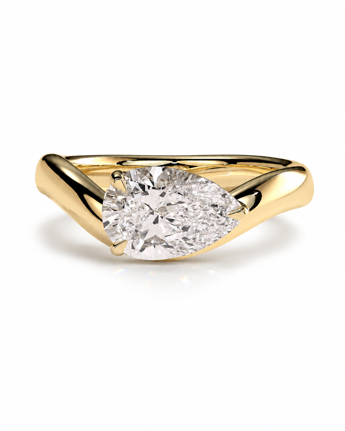 color_10K_YG, color_14K_YG &&A yellow gold ring featuring a large pear-cut diamond in a split-shank setting, shown on a clean white background.