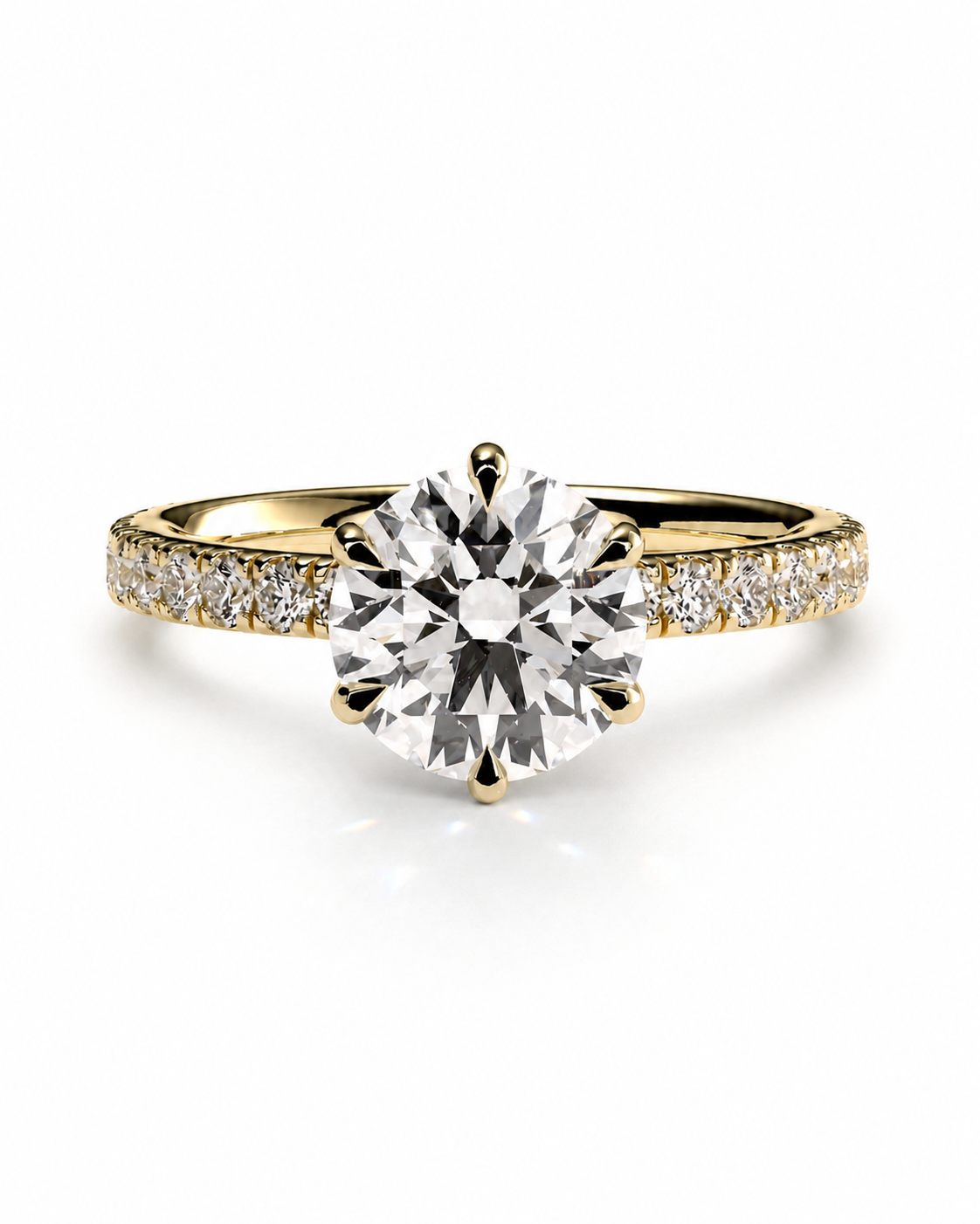 color_10K_YG, color_14K_YG &&A yellow gold solitaire engagement ring with a round brilliant-cut center stone and pavé-set accent diamonds along the shoulders, shown on a clean white background.