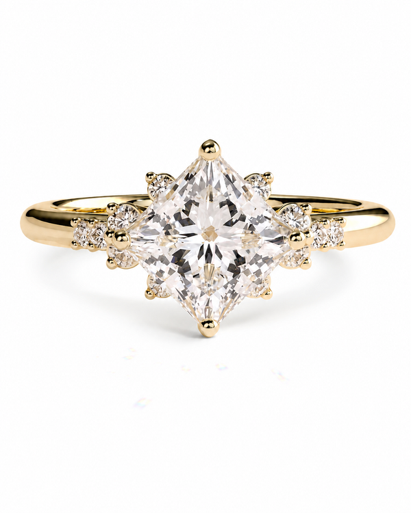 color_10K_YG, color_14K_YG &&A yellow gold ring featuring a large marquise-cut clear center stone with smaller round-cut stones set along the shoulders, shown on a plain white background.