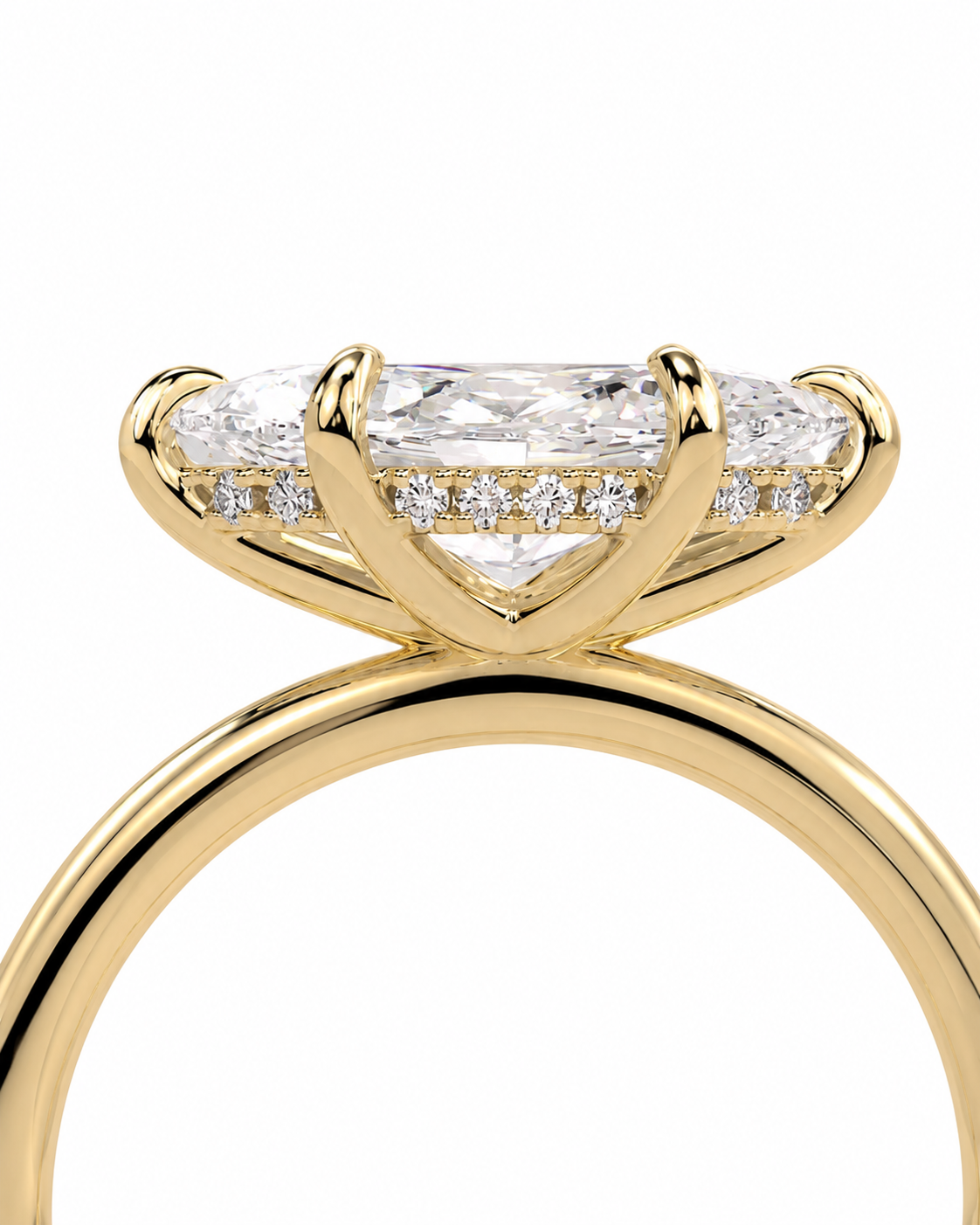 color_10K_YG, color_14K_YG &&A close-up of a yellow gold ring featuring a marquise-cut diamond center stone with smaller round diamonds set along the band, shown against a plain white background.