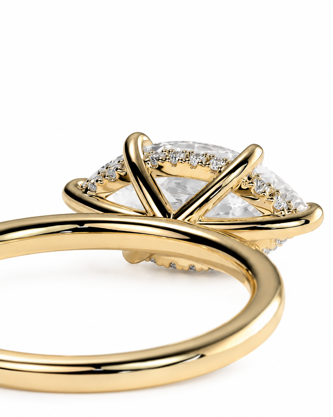color_10K_YG, color_14K_YG &&A close-up shot of a yellow gold ring featuring a large marquise-cut clear center stone and smaller accent diamonds, set against a clean white background.