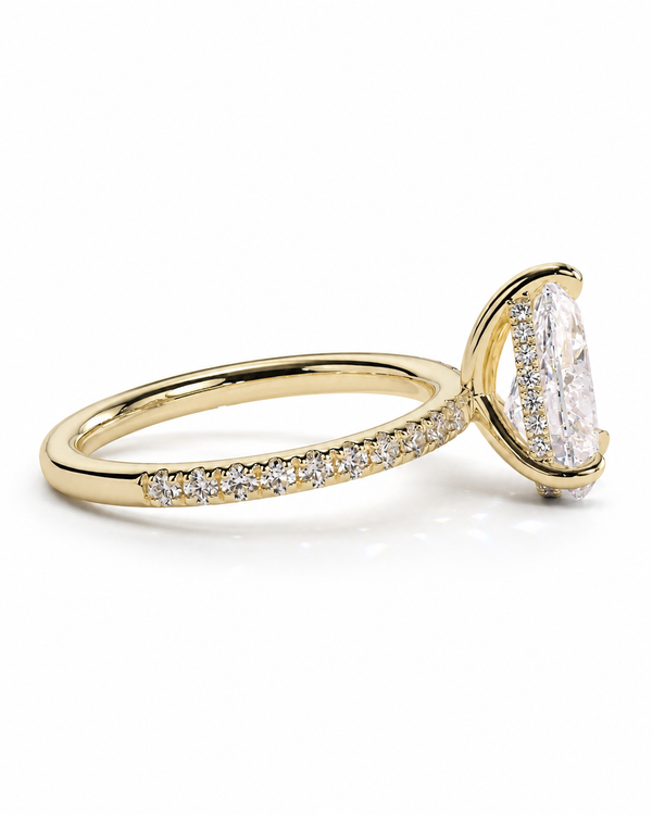 color_10K_YG, color_14K_YG &&A yellow gold engagement ring featuring a large oval-cut clear center stone and a pavé-set diamond band, shown on a clean white background.