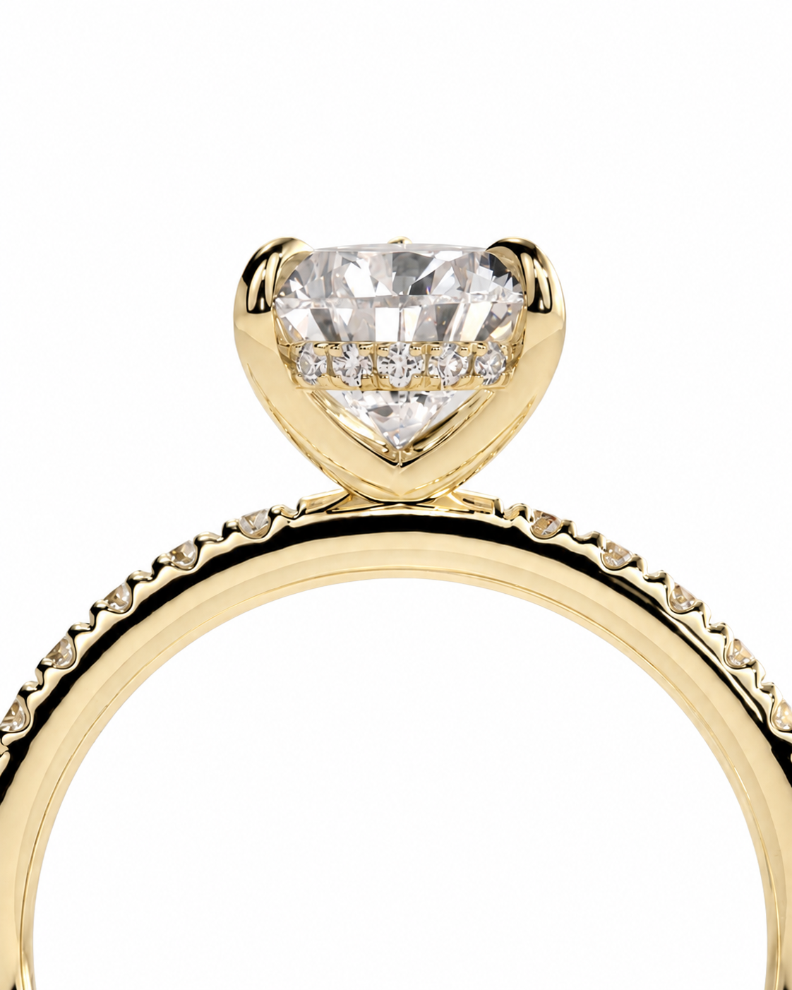 color_10K_YG, color_14K_YG &&A close-up of a yellow gold ring featuring a heart-shaped clear gemstone in a prong setting, with small accent stones along the band, shown against a plain white background.