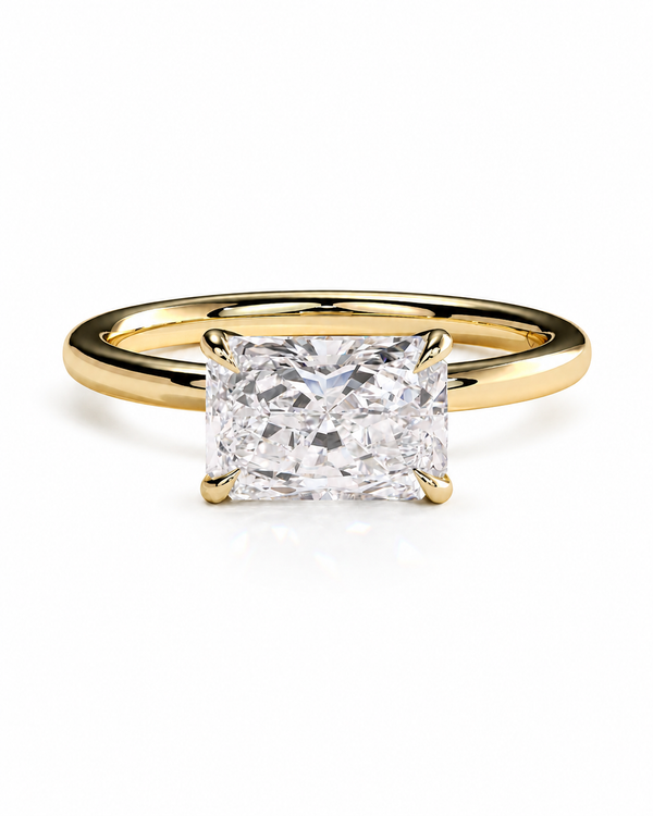 color_10K_YG, color_14K_YG &&A yellow gold ring featuring a large rectangular princess-cut diamond in a four-prong setting, shown on a clean white background.