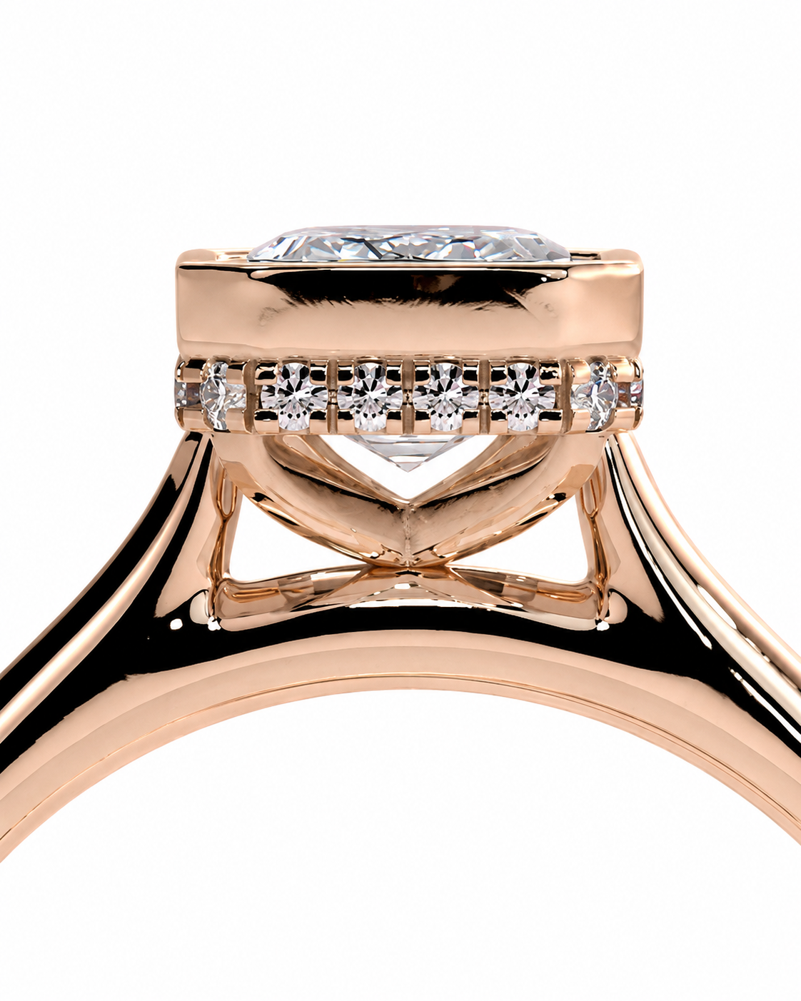 color_10K_RG, color_14K_RG &&
Close-up of a rose gold ring with a round-cut center stone and a row of small pave-set diamonds on the band, shown against a plain white background.