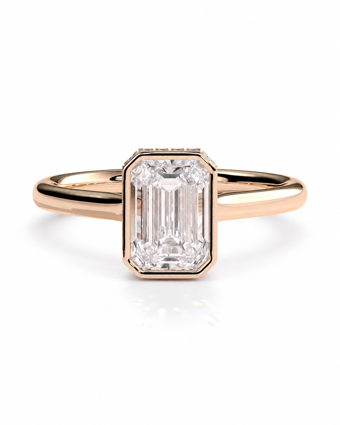 color_10K_RG, color_14K_RG &&
A rose gold engagement ring featuring an emerald-cut clear diamond center stone, set against a clean white background.