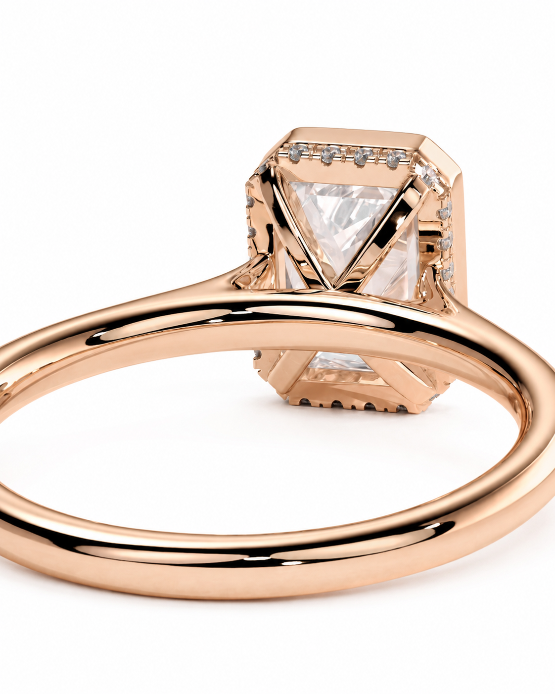 color_10K_RG, color_14K_RG &&
Rose gold ring with a large clear triangular center stone and smaller accent stones, shown on a clean white background.