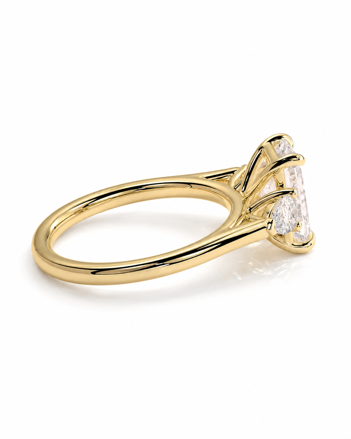 color_10K_YG, color_14K_YG &&A yellow gold ring featuring a large marquise-cut clear gemstone in a four-stone cluster setting, shown on a clean white background.