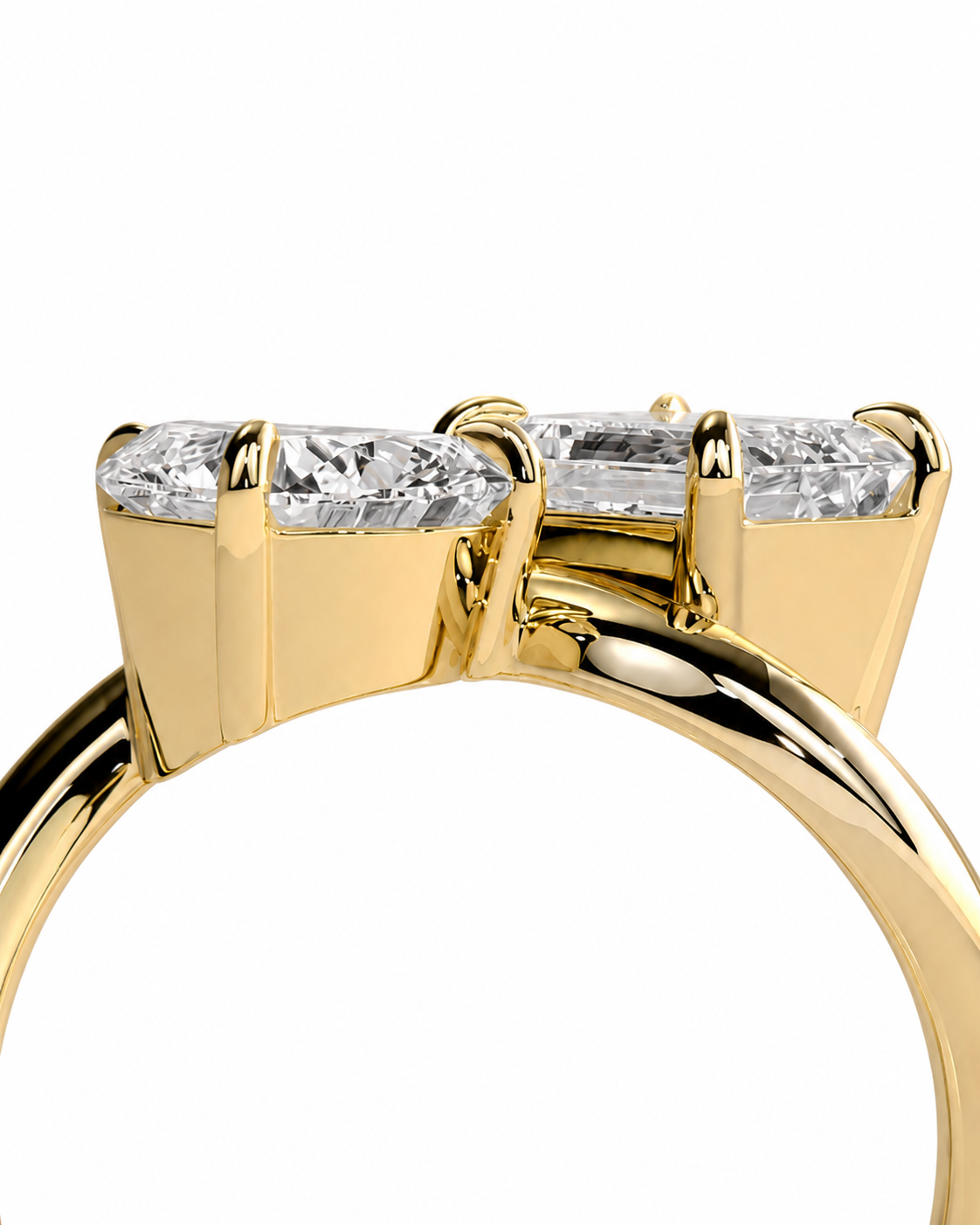 color_10K_YG, color_14K_YG &&Close-up of a yellow gold ring setting with three clear rectangular-cut gemstones on a white background.