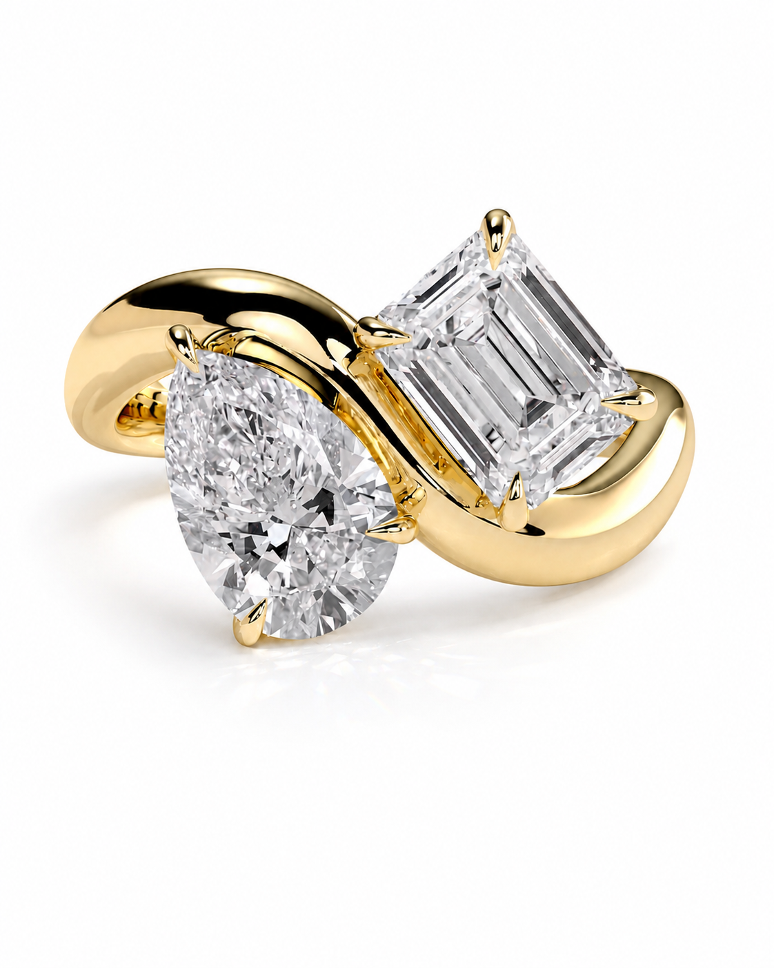 color_10K_YG, color_14K_YG &&A yellow gold ring featuring a pear-cut diamond on one side and an emerald-cut diamond on the other, set against a clean white background.