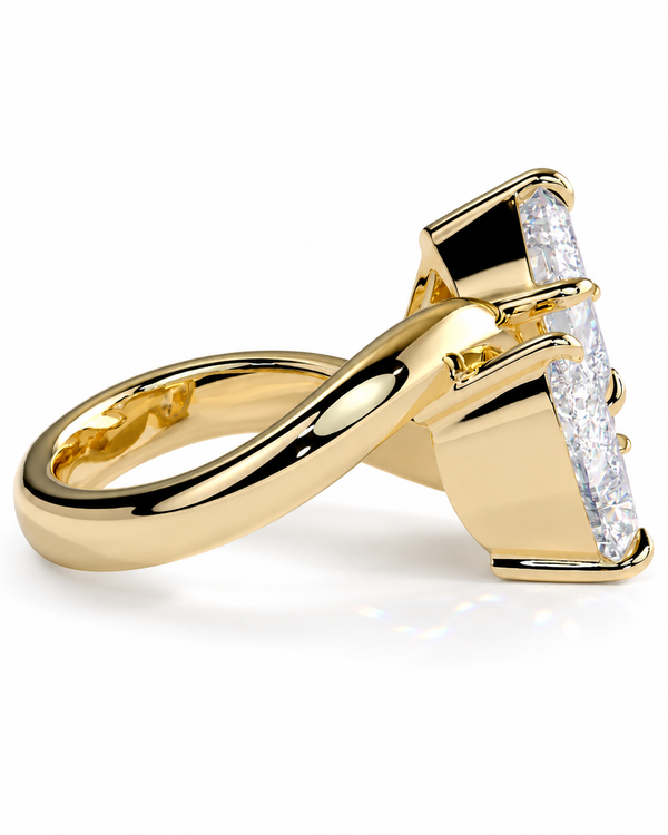 color_10K_YG, color_14K_YG &&A yellow gold ring with a wide band and a large rectangular baguette-cut diamond set in a prong setting, shown on a clean white background.