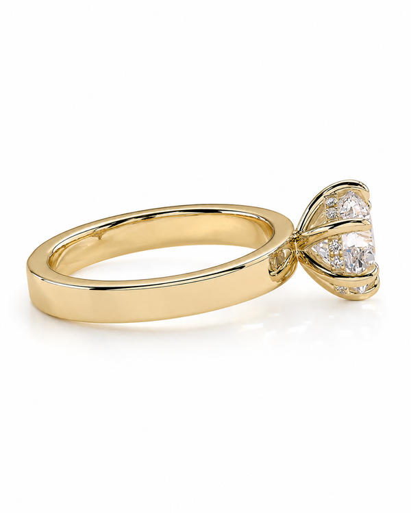 color_10K_YG, color_14K_YG &&A yellow gold ring featuring a unique bow-like setting with three clear round-cut gemstones, shown on a clean white background.