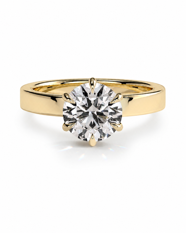 color_10K_YG, color_14K_YG &&A classic solitaire engagement ring featuring a round brilliant-cut diamond set in a polished yellow gold band, shown against a clean white background.