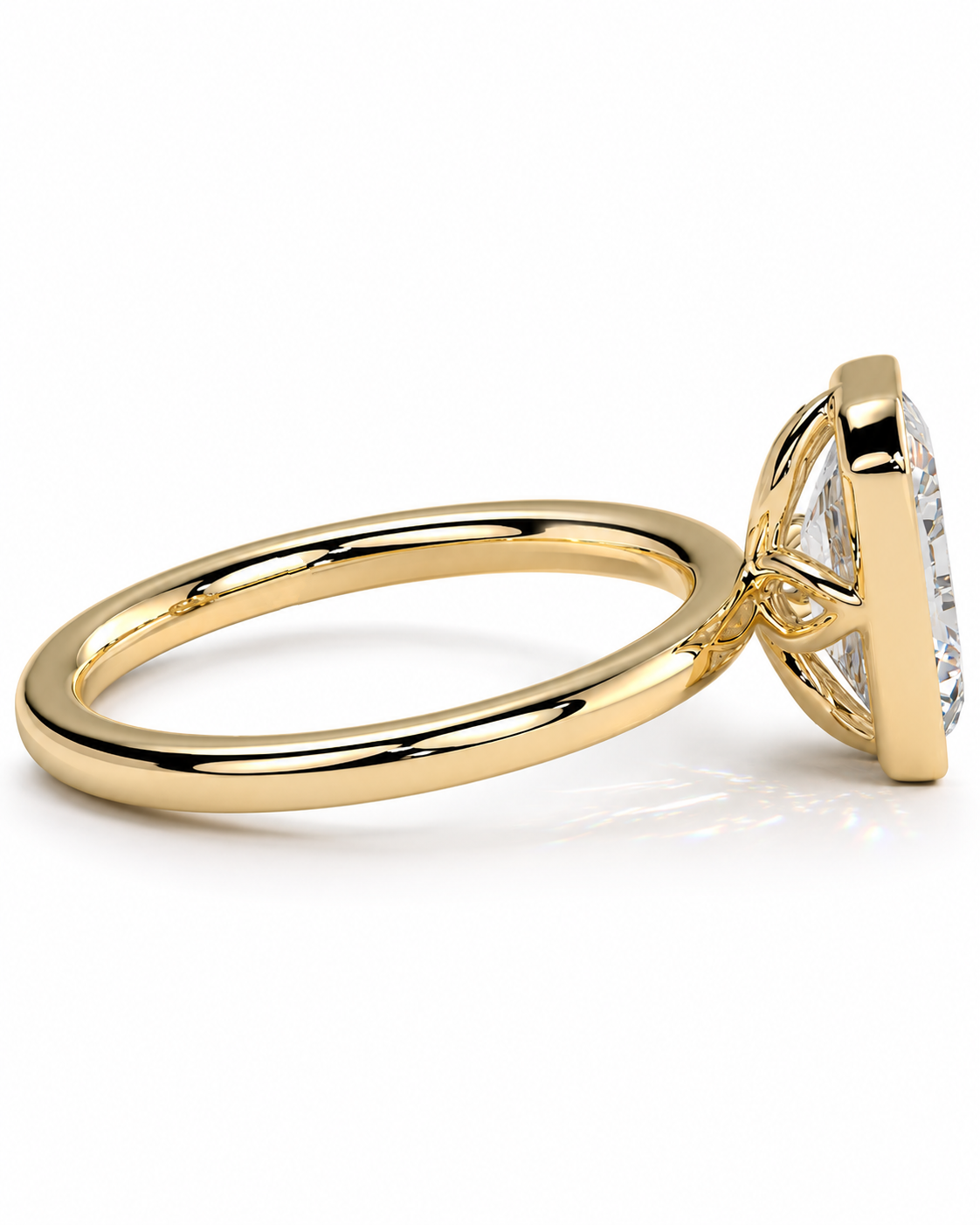color_10K_YG, color_14K_YG &&A yellow gold solitaire engagement ring with a large clear round-cut gemstone in a prong setting, shown on a clean white background.