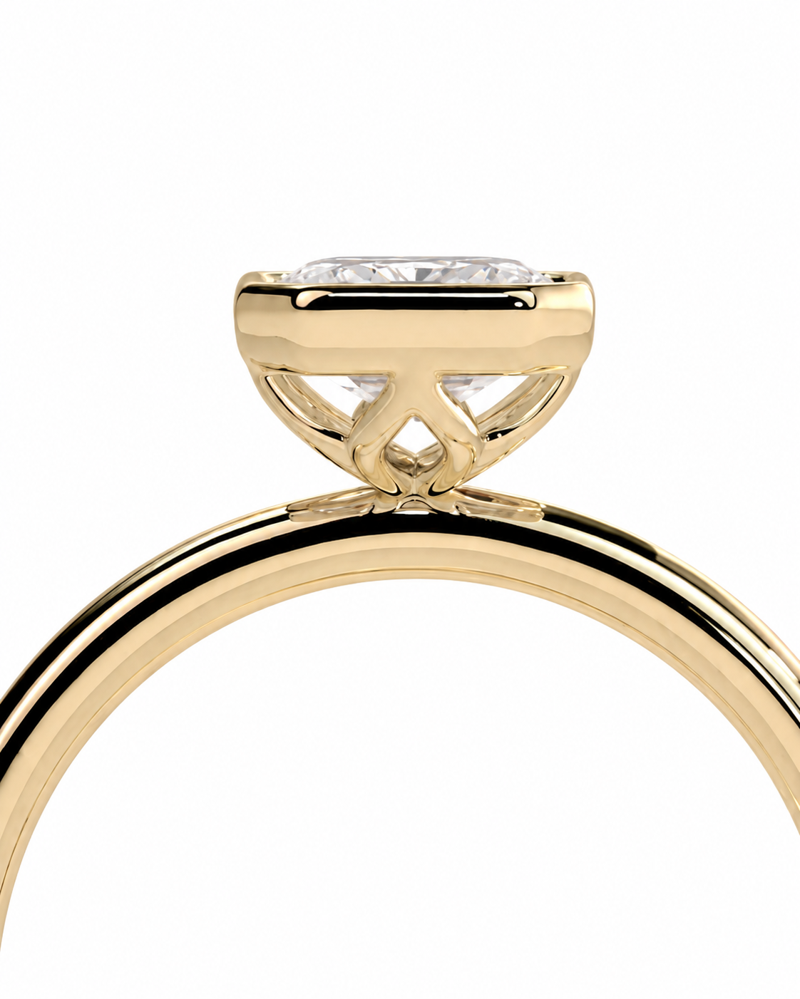 color_10K_YG, color_14K_YG &&Close-up of a yellow gold ring with a clear round gemstone in a prong setting, shown against a plain white background.