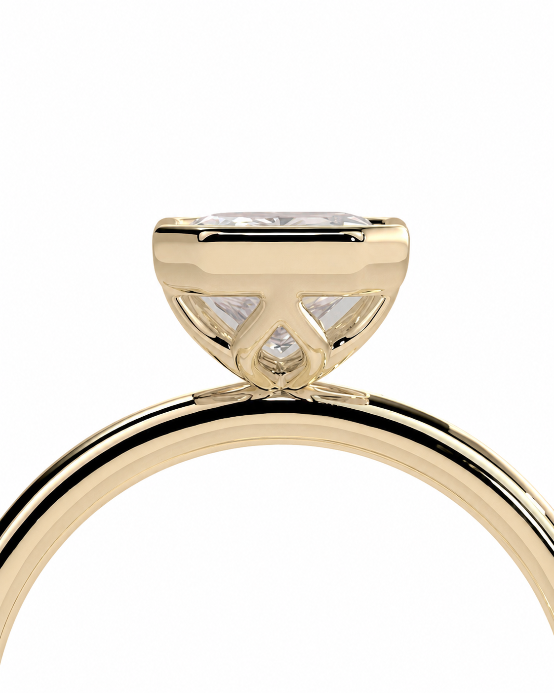 color_10K_YG, color_14K_YG &&A close-up of a yellow gold solitaire engagement ring with a round brilliant-cut diamond, set against a solid white background.