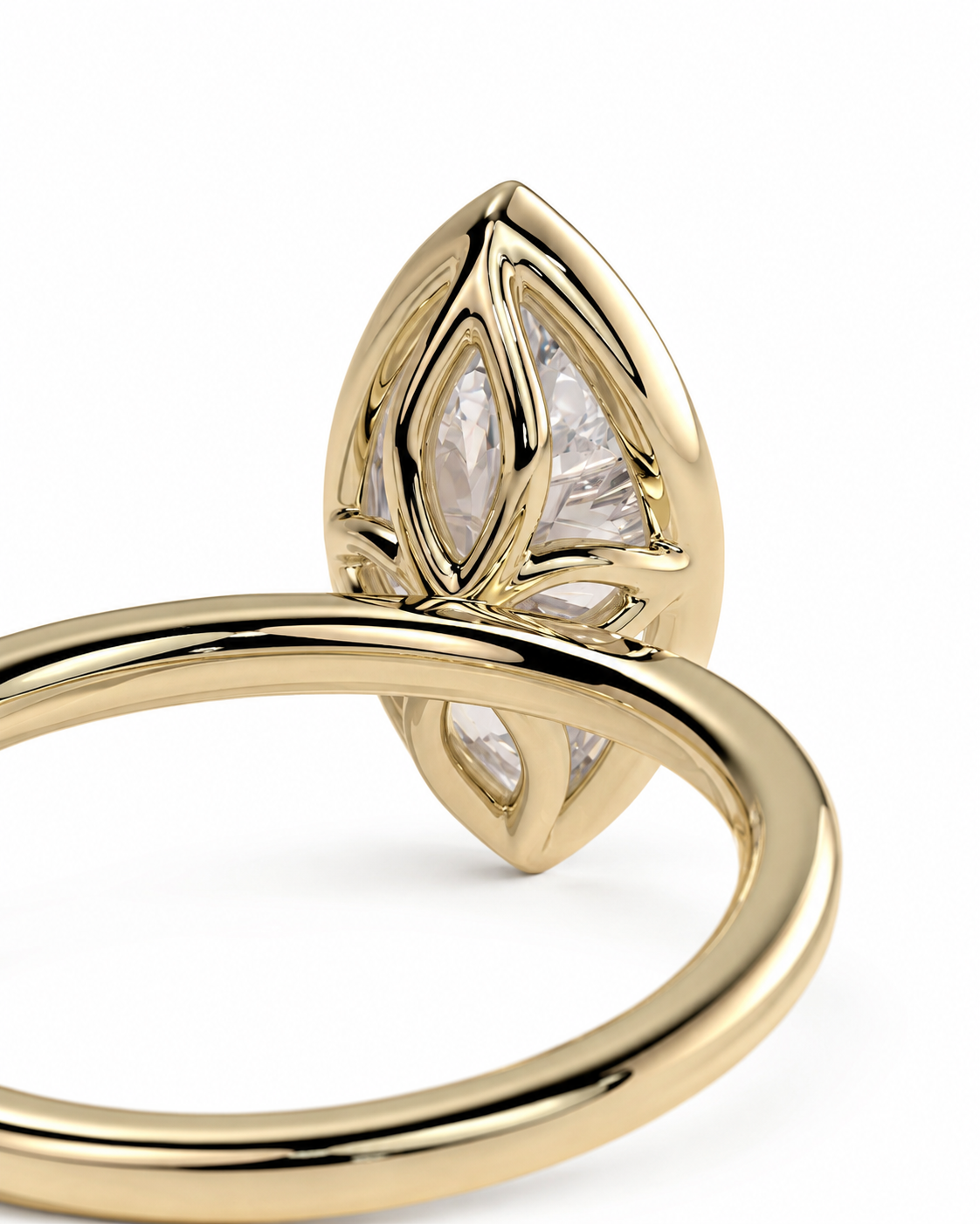 color_10K_YG, color_14K_YG &&A close-up of a gold ring featuring a marquise-shaped setting with clear marquise-cut gemstones, shown on a plain white background.