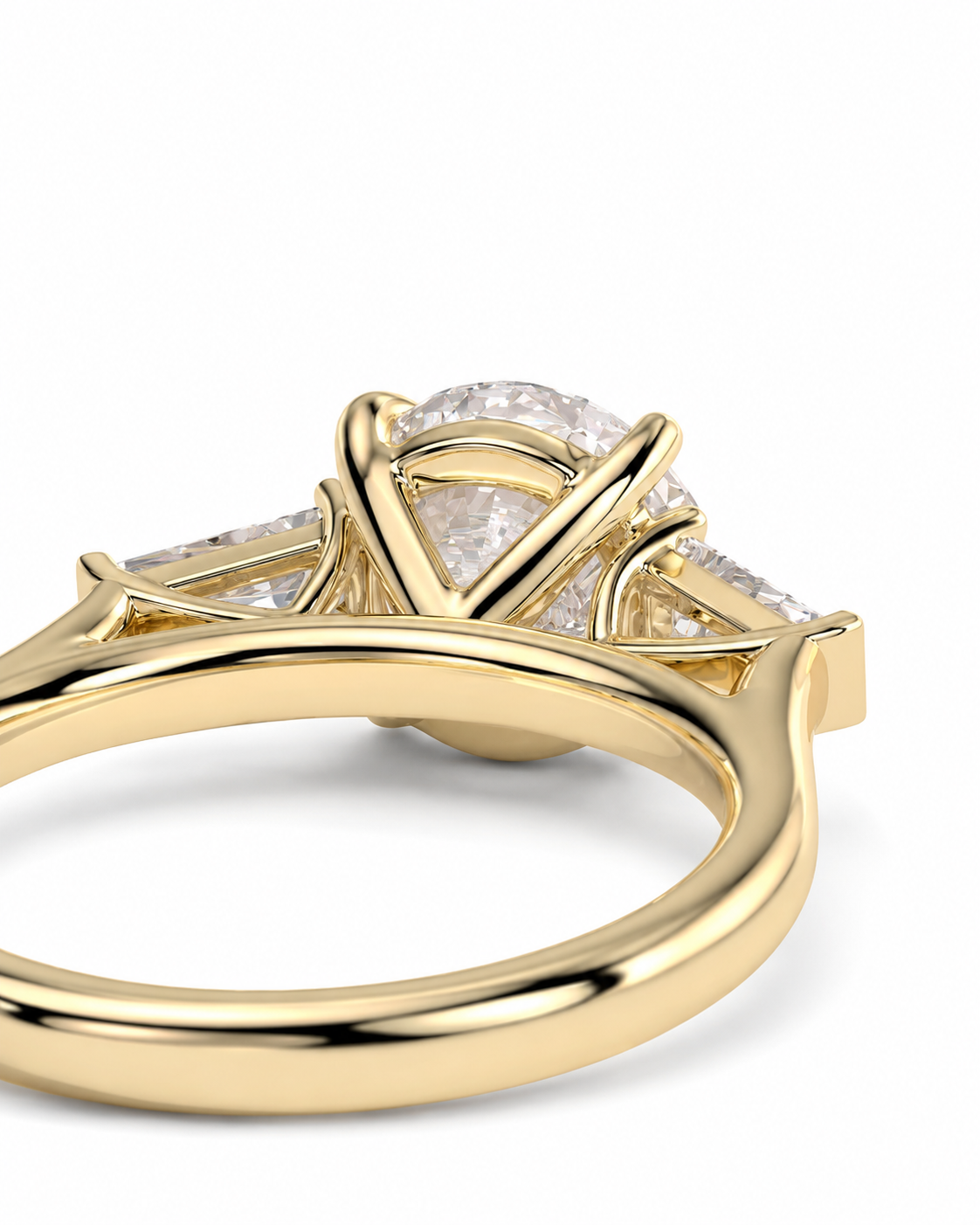 color_10K_YG, color_14K_YG &&A close-up shot of a yellow gold ring with a large round center stone and smaller side stones, shown on a plain white background.