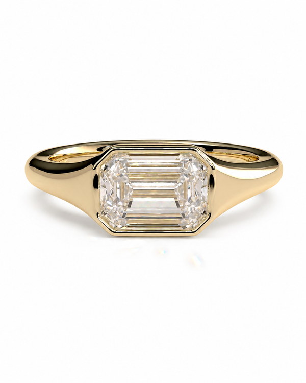 color_10K_YG, color_14K_YG &&A yellow gold ring featuring a large emerald-cut diamond center stone in an octagonal bezel setting, shown on a clean white background.