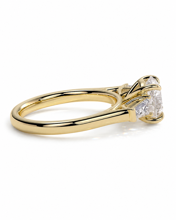 color_10K_YG, color_14K_YG &&A yellow gold solitaire engagement ring with a clear round-cut diamond, shown on a clean white background.